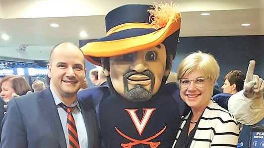 Charlottesville Chamber Board Chairman Pete Caramanis and President Elizabeth Cromwell with Cavman