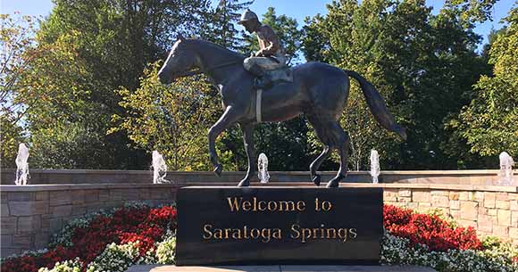 racing horse and rider statue