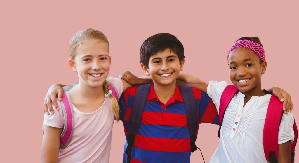 Digital composite of Kids friends together in blank pink room
