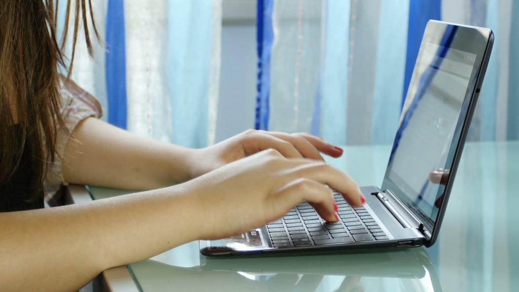 young-woman-chatting-with-someone-using-laptop-computer-closeup-on-her-hands_v9mvdycnqx__F0000 young-woman-chatting-with-someone-using-laptop-computer-closeup-on-her-hands_v9mvdycnqx__F0000