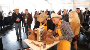 Sculptors Vic and Dustin Payne work on a set of Western bookends during the Buffalo Bill Art Show & Sale's Quick Draw event