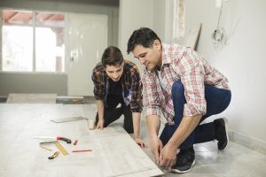 House flipping installing wood floor