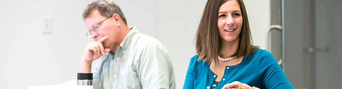Advocacy page banner Tondee Lutterman and Mark Shuster participtate in a Nonprofit Connect board meeting.