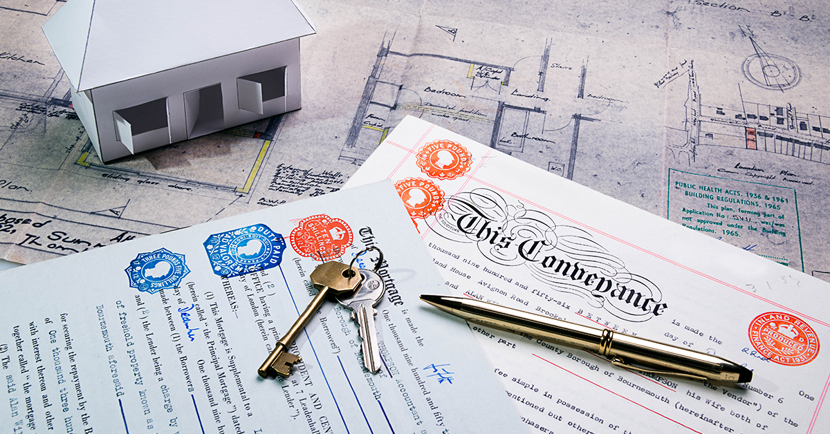 Property and Mortgage deeds sit on top of plans