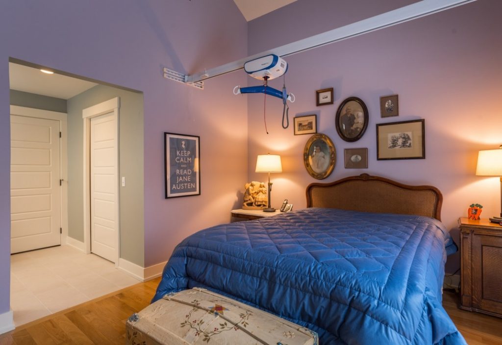 Bedroom remodel featuring ceiling lift for handicapped