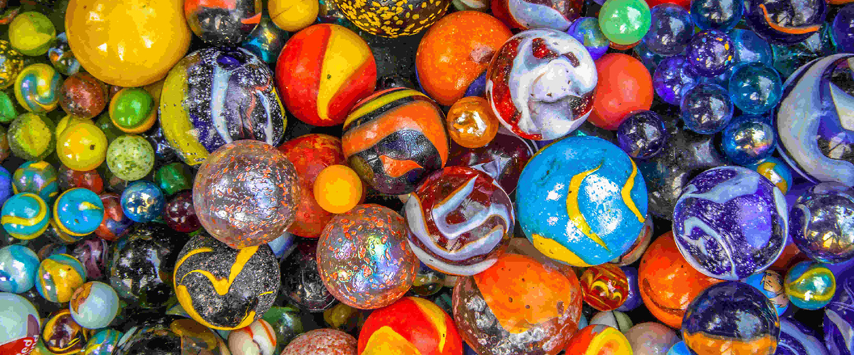 Background of colorful glass marbles as a concept for diversity